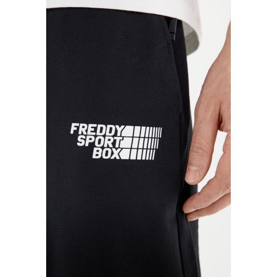 Men's tapered stretch trousers with zipped pockets