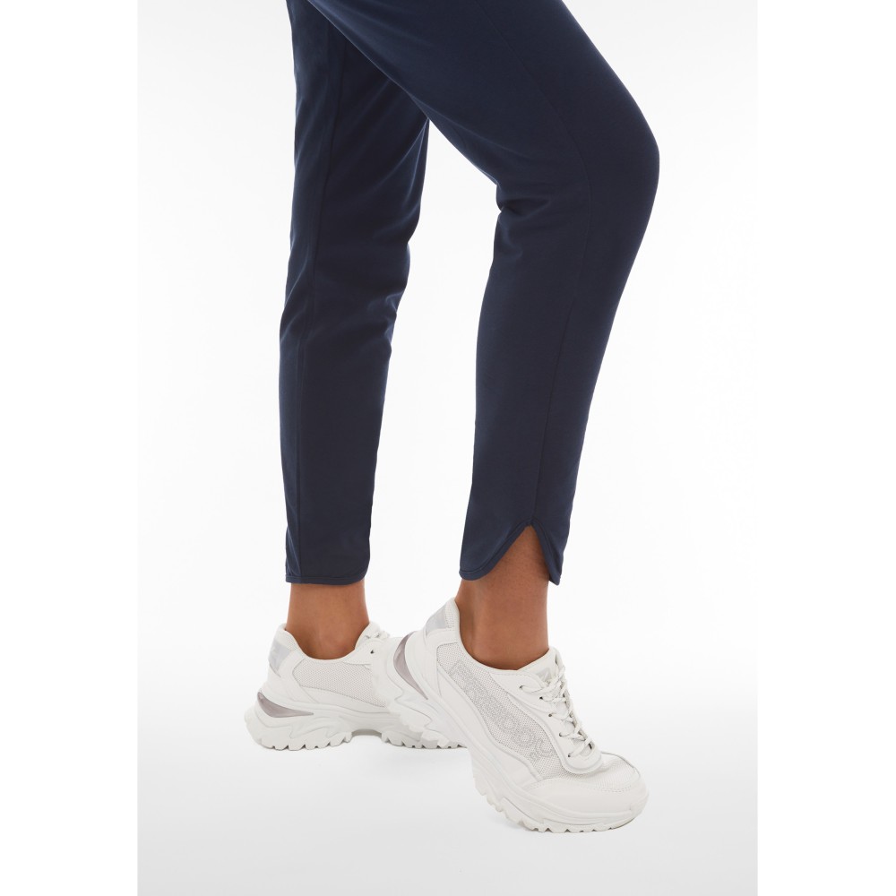 Pantaloni da donna slim fit in jersey con fondo stondato