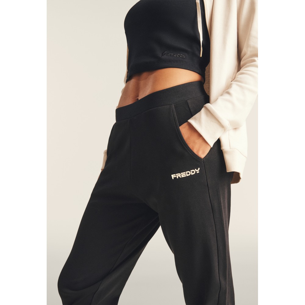 Tuta Interlock Con Zip e Collo Alto Ampio Donna