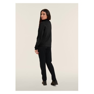 Tuta con zip e collo alto, logo con perline sulla manica