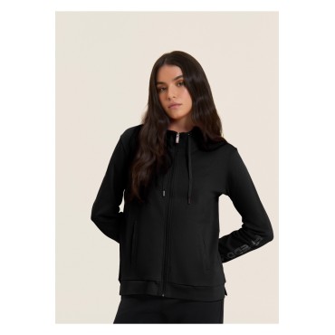 Tuta con zip e collo alto, logo con perline sulla manica 2