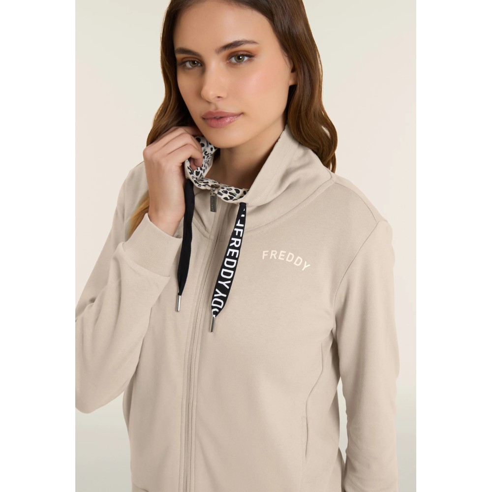 Tuta con zip e collo alto con interno animalier